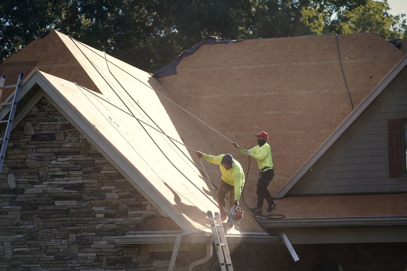 Legacy Roof SC crew working along a gable