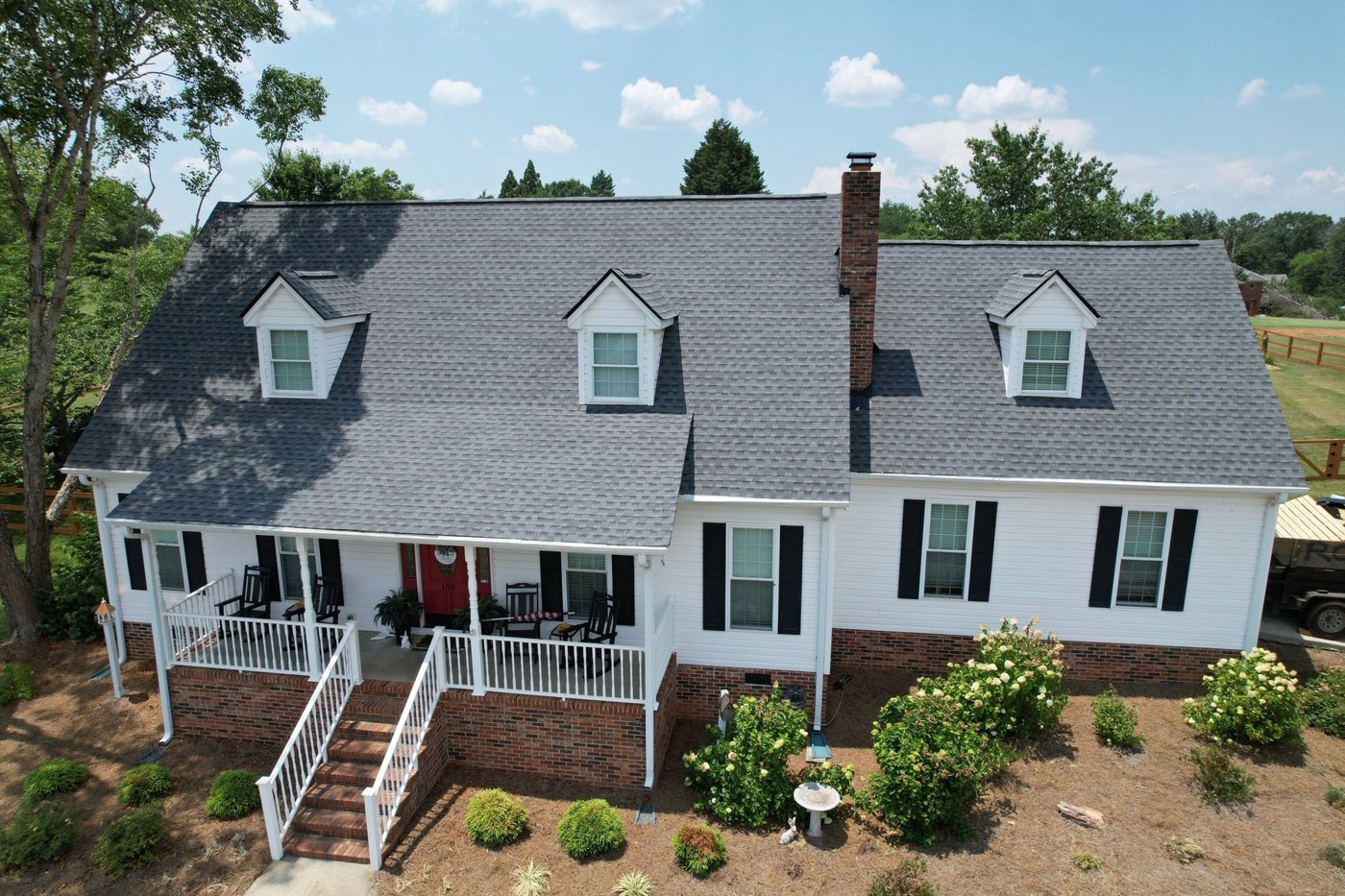 White Cape Cod home with three front dormers, Upstate SC